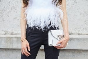 white prada clutch white ostrich feather top