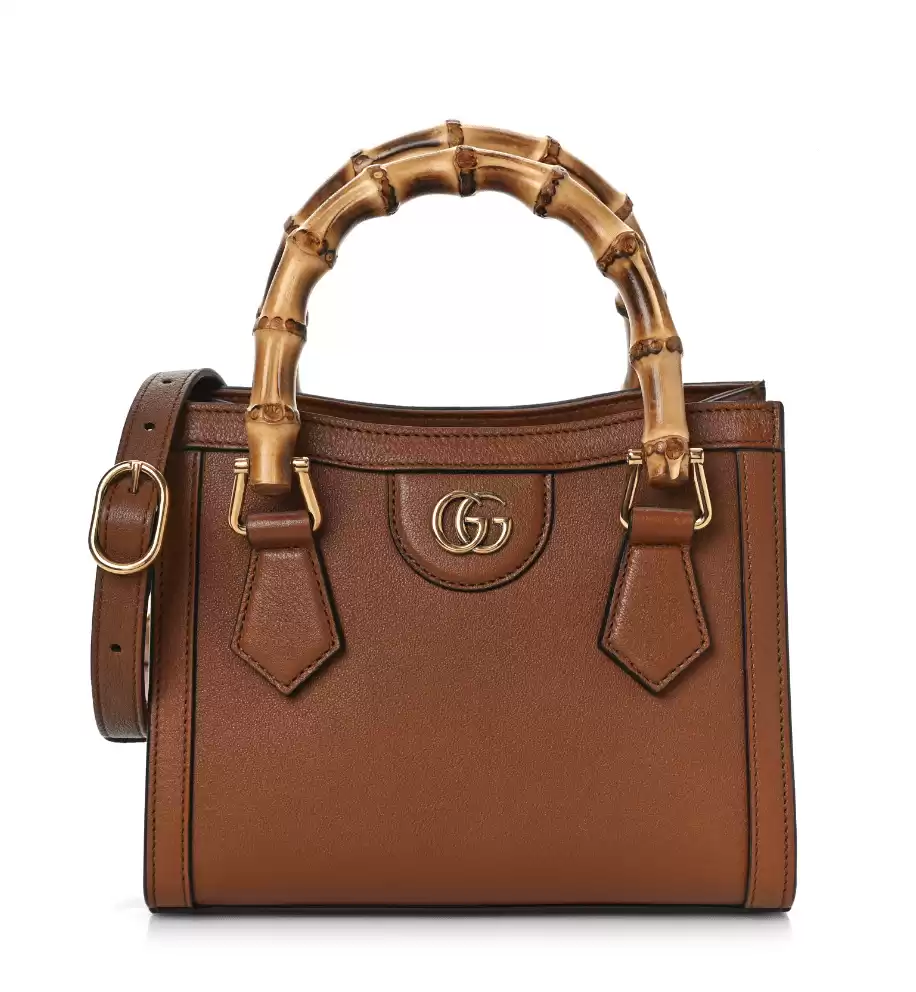 How much does a gucci purse cost hotsell