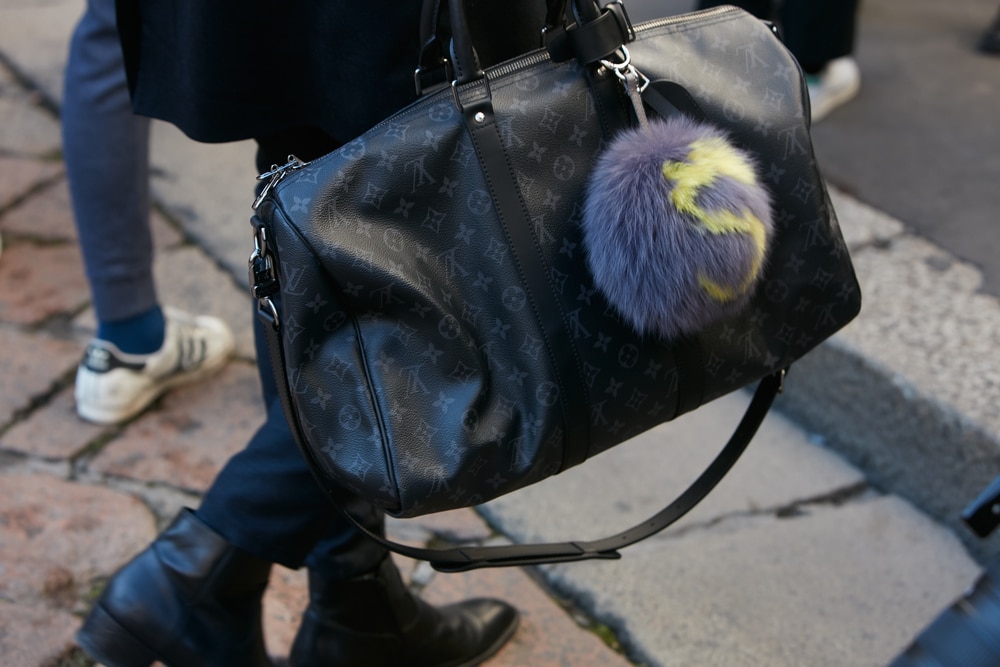 16 Best Designer Bags That Are Always On Trend According to Bagover Editors 5 Louis Vuitton Speedy in black monogram with black leather trim