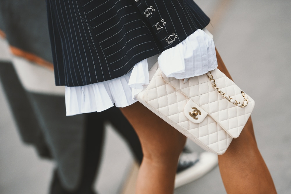 chanel classic flap in white with blazer and skirt gold hardware