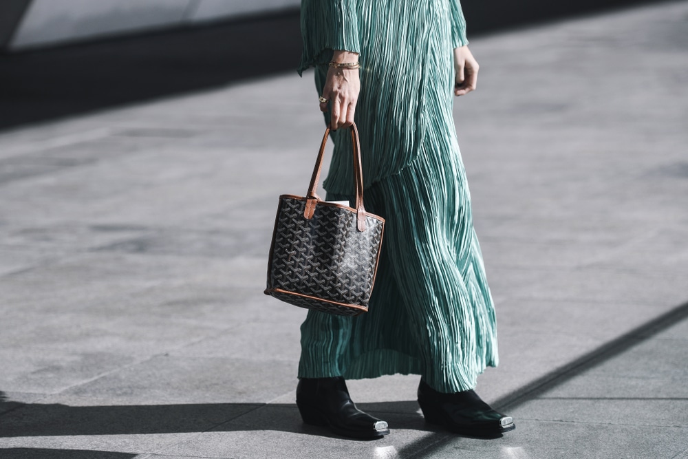 16 Best Designer Bags That Are Always On Trend According to Bagover Editors 11 goyard st louis tote in black and tan
